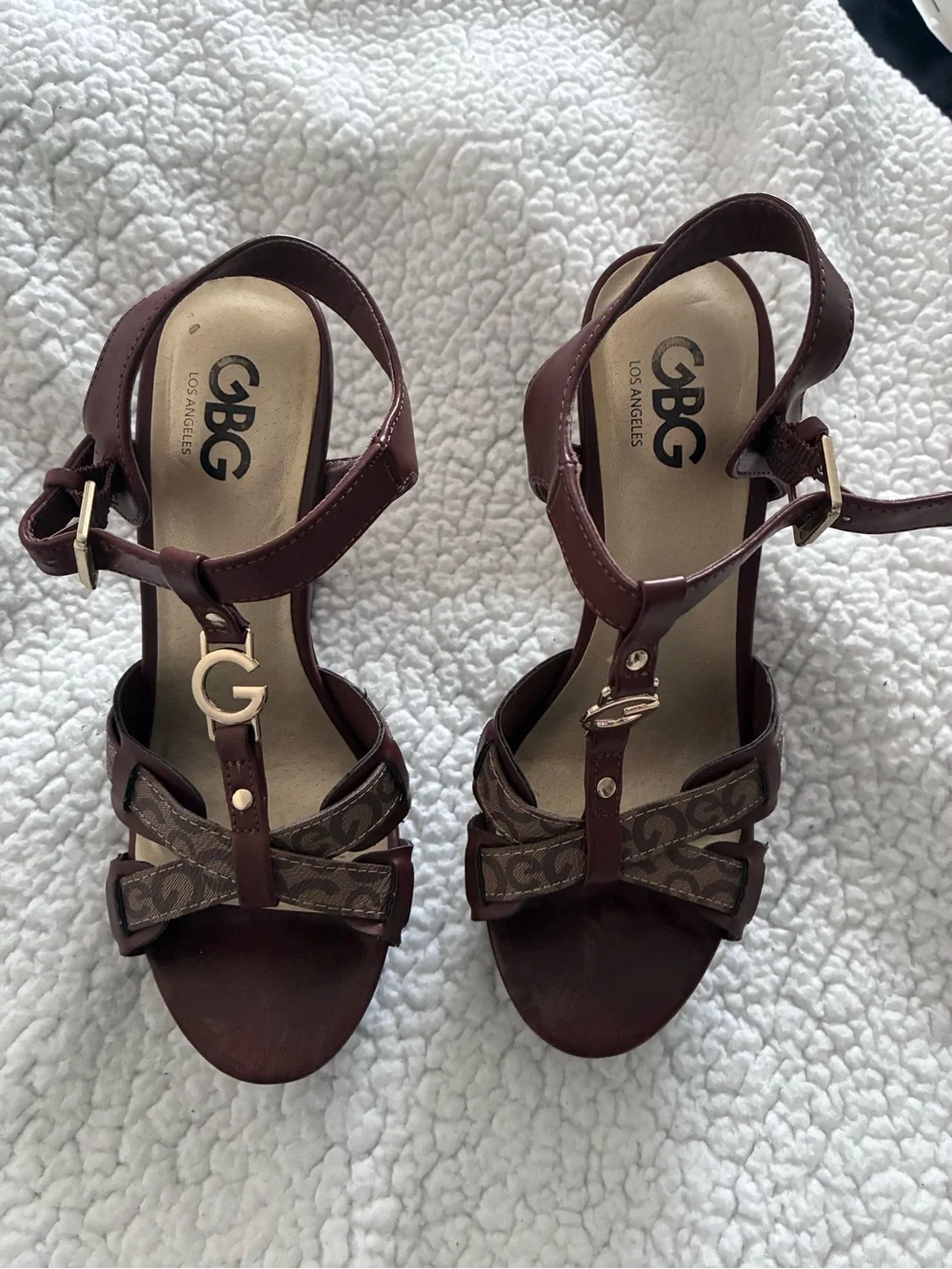 GBG Los Angeles Brown T-Strap Heels with Monogram Bow